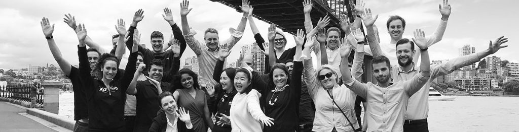 Team on Sydney waterfront laughing